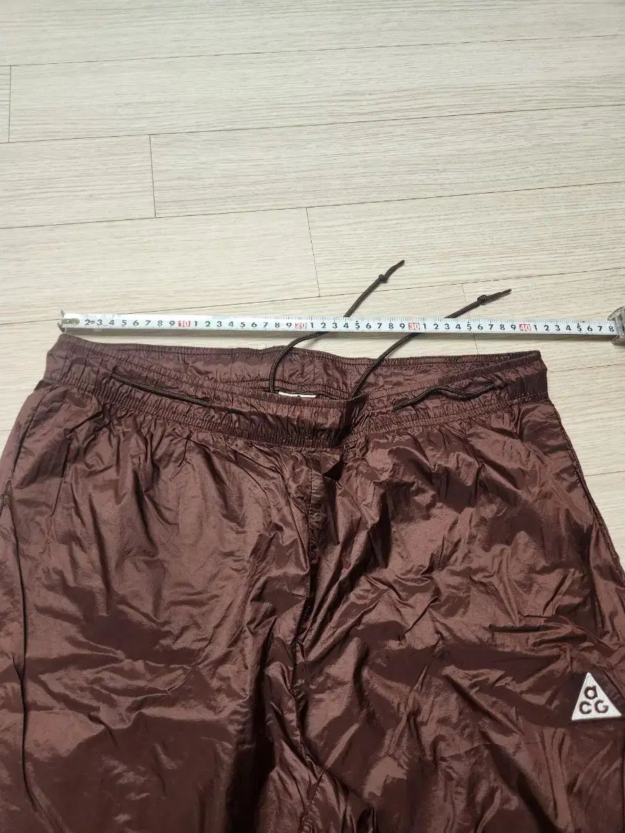 ナイキ ACG WIND AND WISH パンツ ブラウン