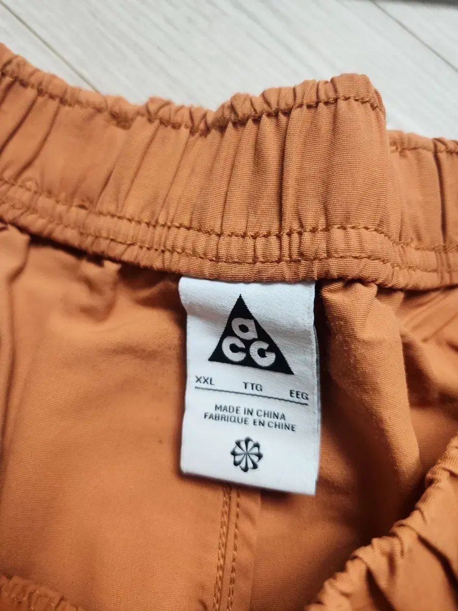  ナイキ ACG ハーフパンツ オレンジ ショートパンツ ハーフパンツ パンツ