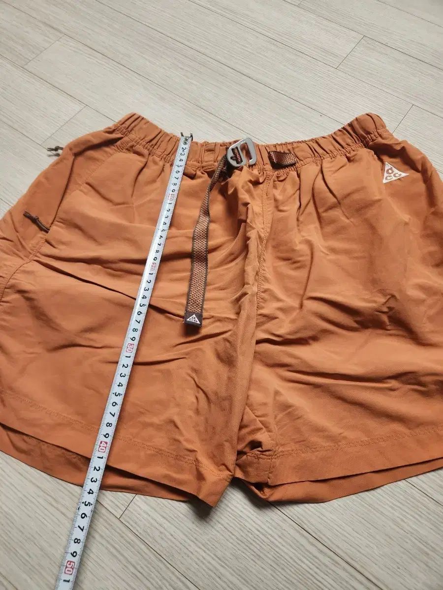 ナイキ ACG ハーフパンツ オレンジ