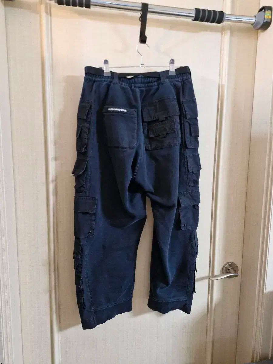 ナイキ ピースマイナスワン ワイド パンツ XS