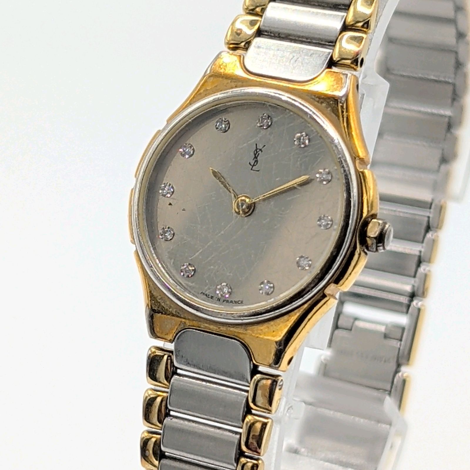 YVES SAINT LAULENT Watch Quartz Round Silver G 12P Y2K 00S Vintage イブサンローラン 時計 クオーツ レディース ラウンド シルバー ゴールド 12Pダイヤ ヴィンテージ 不動品