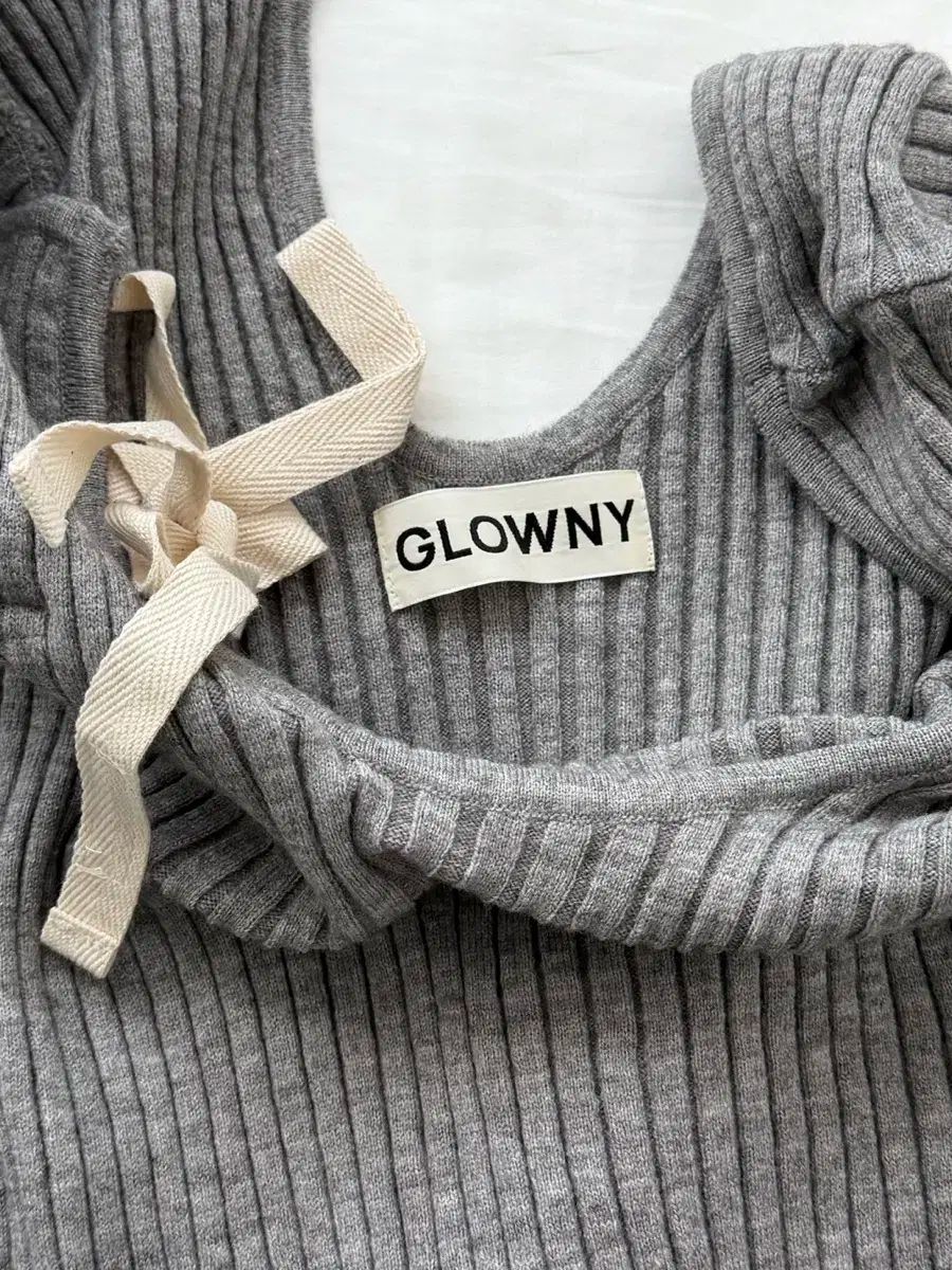 オーシンメトリーニット