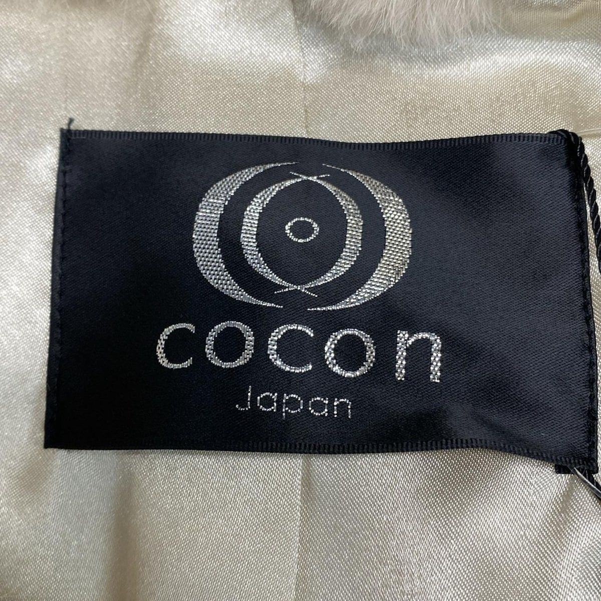 コート サイズL