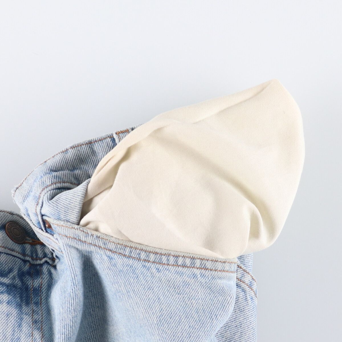 オレンジタブ テーパードデニムパンツ