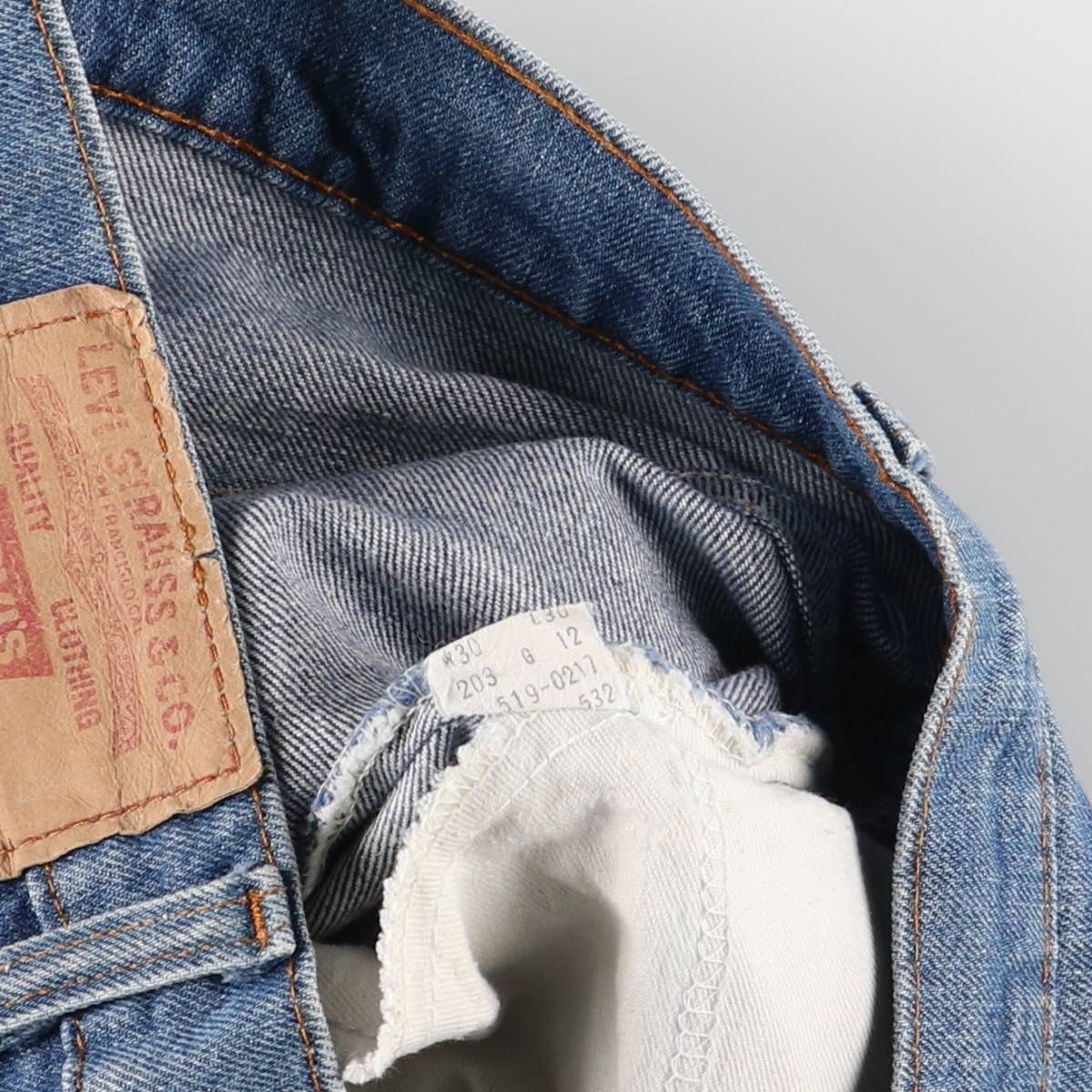 テーパードデニムパンツ