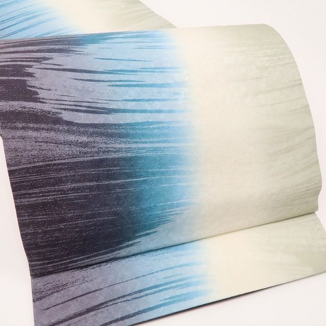 深い色彩の調べに煌めきを添えて 袋帯