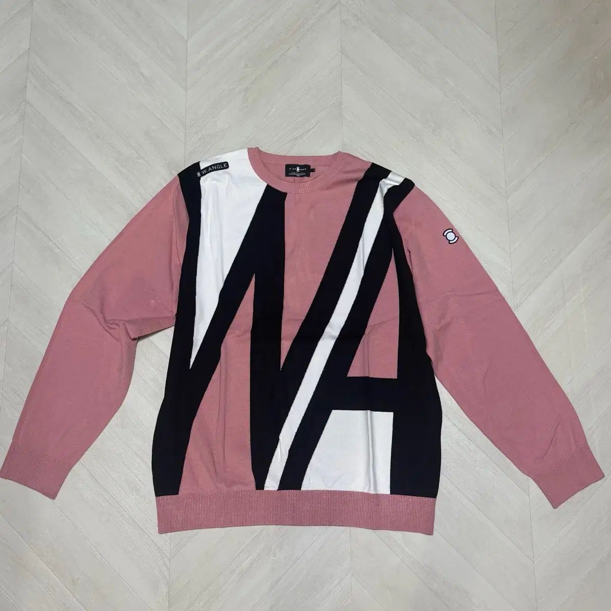 ワイドアングル ピンク ニット 105