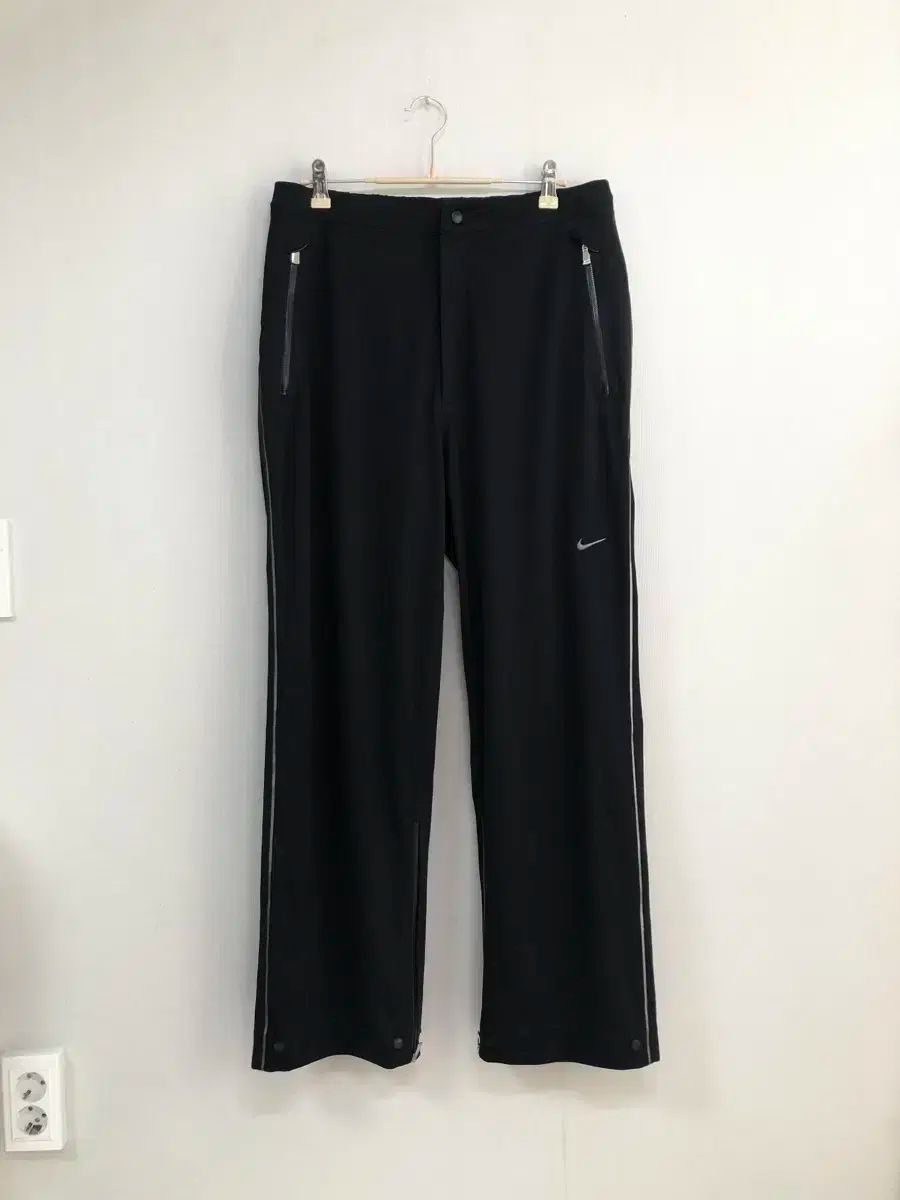 ナイキ ゴルフ 日常生活防水 ツーウェイ ワイド 機能性 ISTJ VENDING MACHINE Ver. ポリ パンツ ゴルフパンツ L