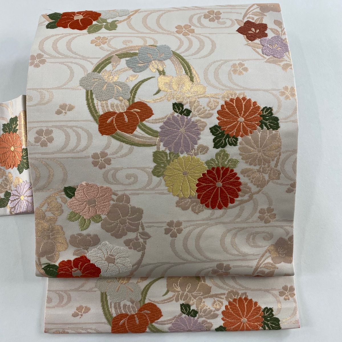 名古屋帯 秀品 花丸文 観世水 唐織 箔 薄ピンク 正絹