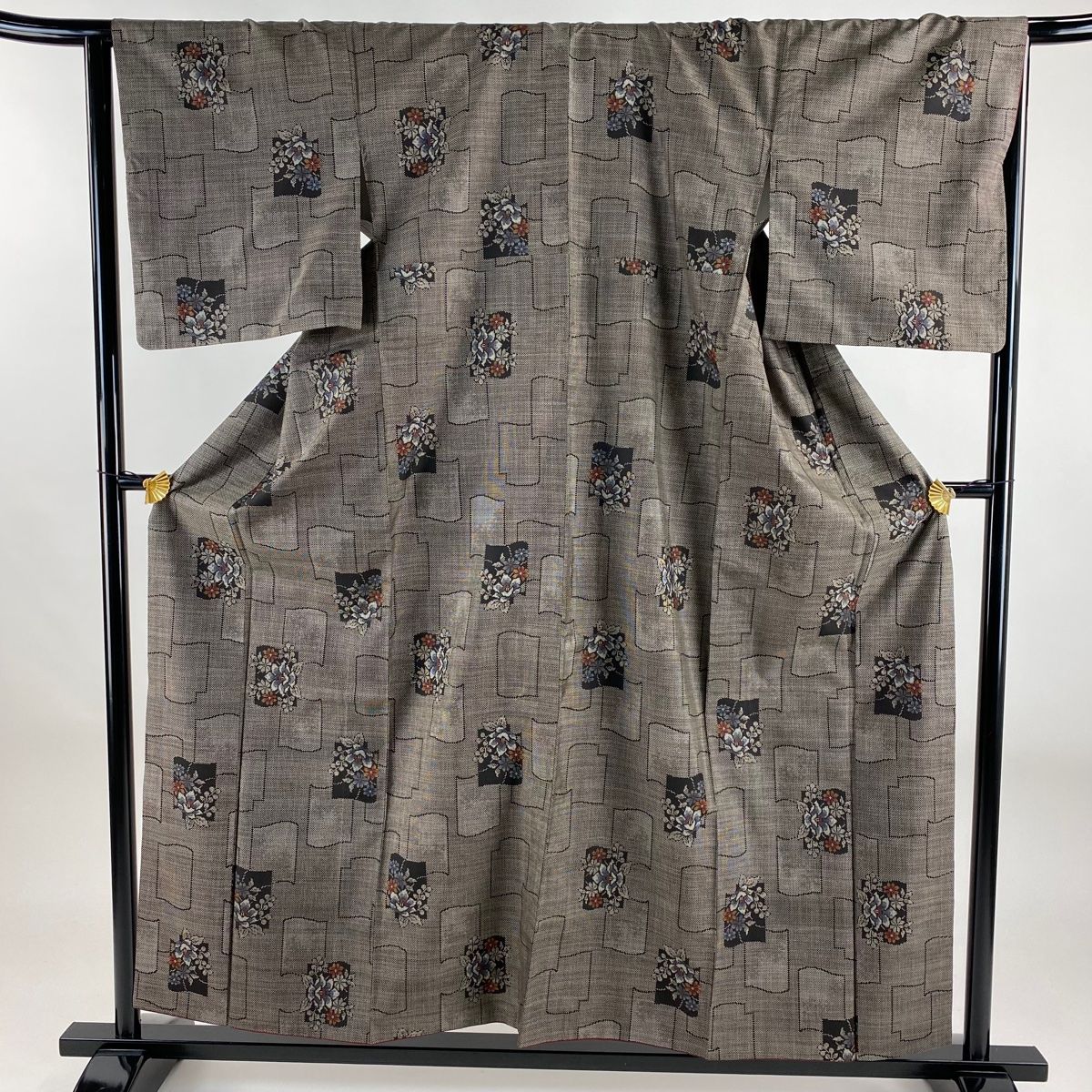 紬 身丈157cm 裄丈65cm M 袷 草花 幾何学 焦茶色 正絹 秀品