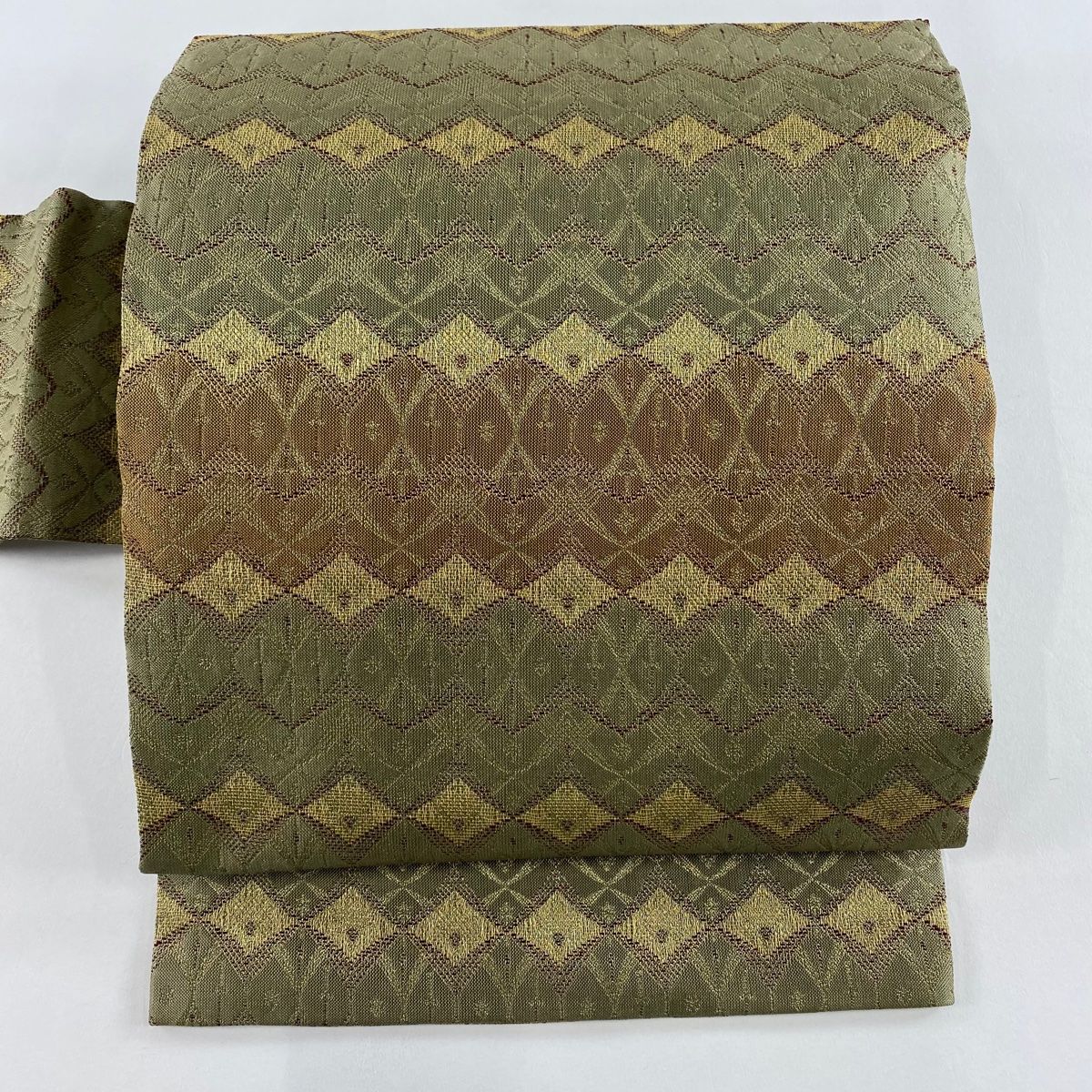 名古屋帯 秀品 幾何学 金糸 薄茶色 正絹