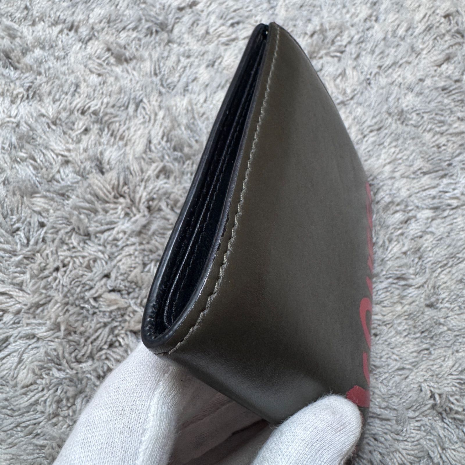 マックイーン 二つ折り財布