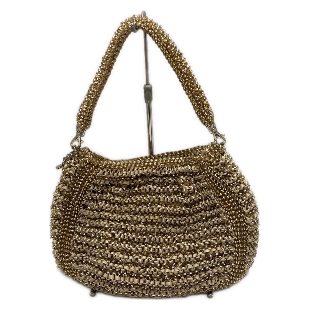 クリスタッロフィオッコ ベージュ×ゴールド×クリア