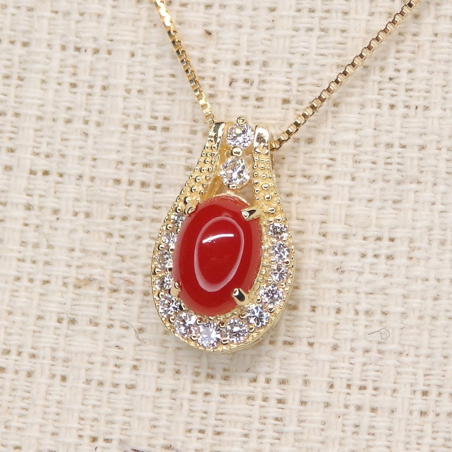 さんご ペンダントTOP Z5250 0.554ct ゴールドK18 オーバル小判 ソーティング付き