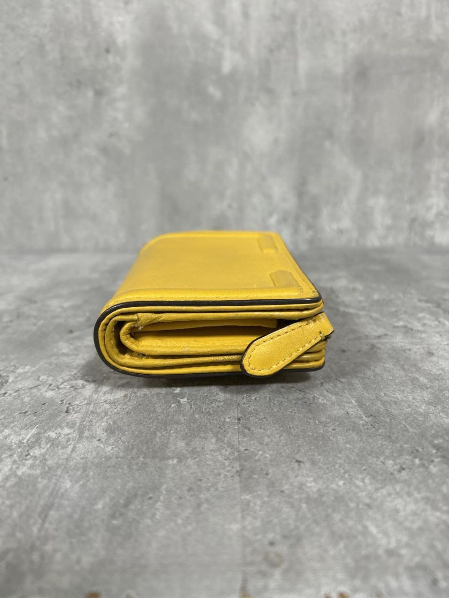 COACH コーチ　折り財布　カナリー　黄色　イエロー　二つ折り財布 COACH コーチ 折り財布 黄色 イエロー 二つ折り財布 - メルカリ