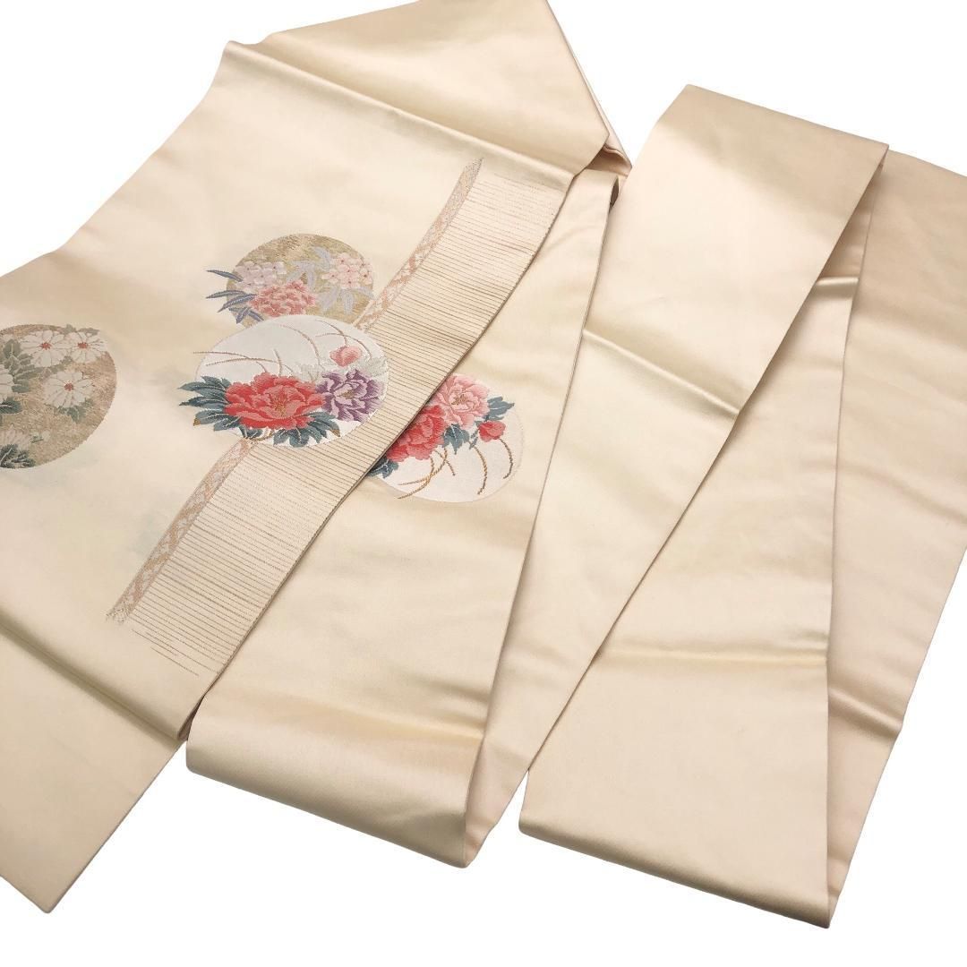 名古屋帯 丸に花模様 薄卵色 金糸 O-5654 名古屋帯 丸に花模様 薄卵色 金糸 O-5654 - メルカリ