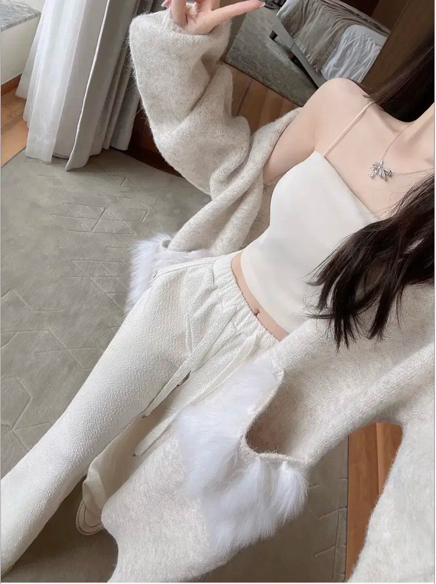 ミエルエルベロニファーポケットウールカーディガン