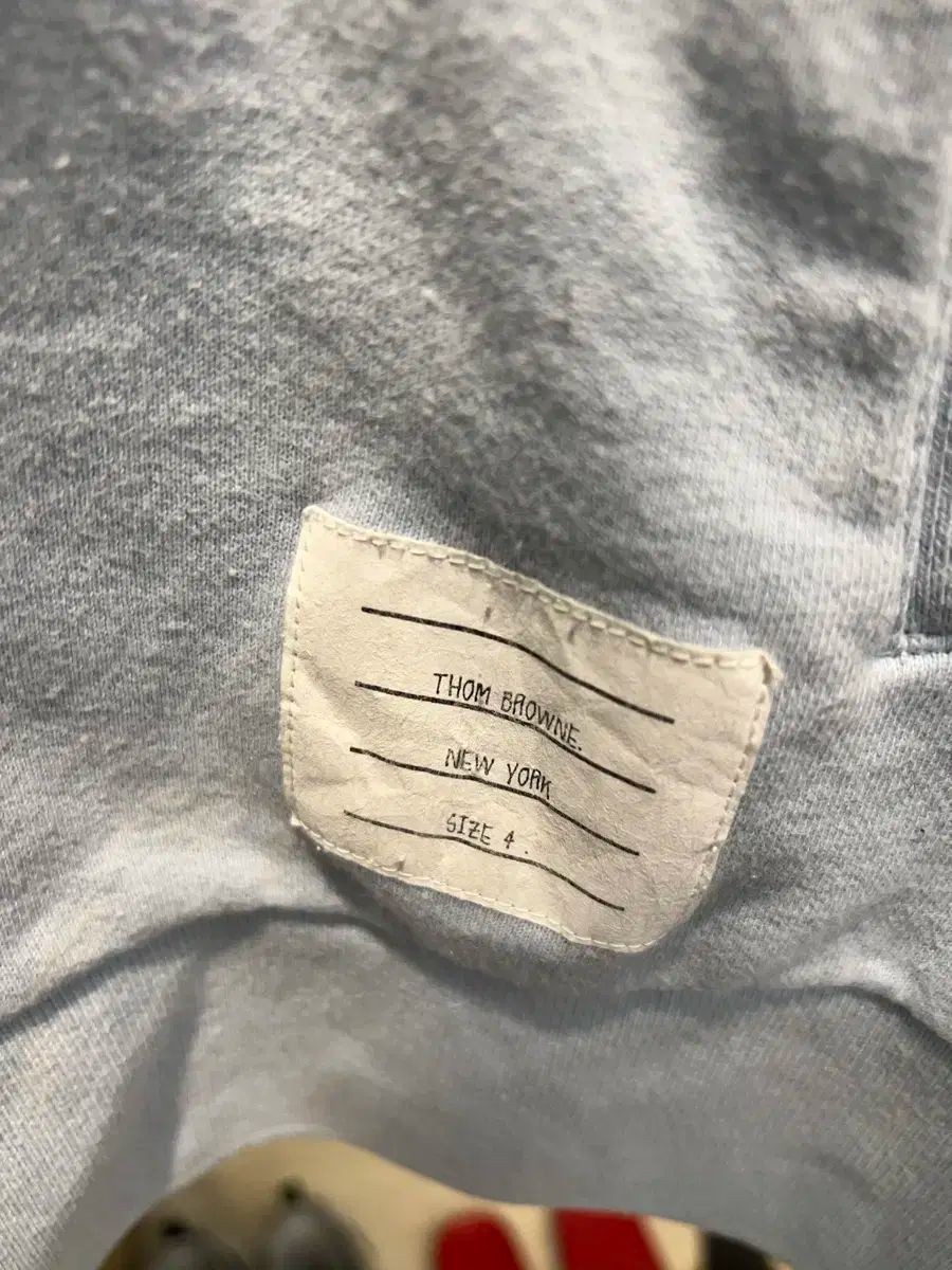 トム ブラウン 斜めボーダー ライトブルー フーディー ジップアップ