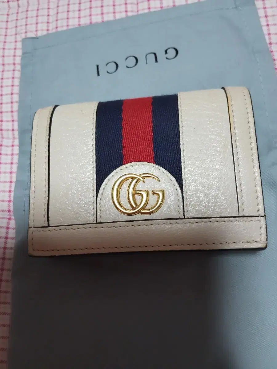 グッチ オフィディア 二つ折り財布 白 トリミング