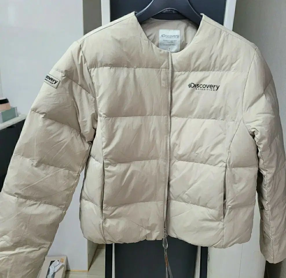 DISCOVERY レディース ダウン アイボリーデパート