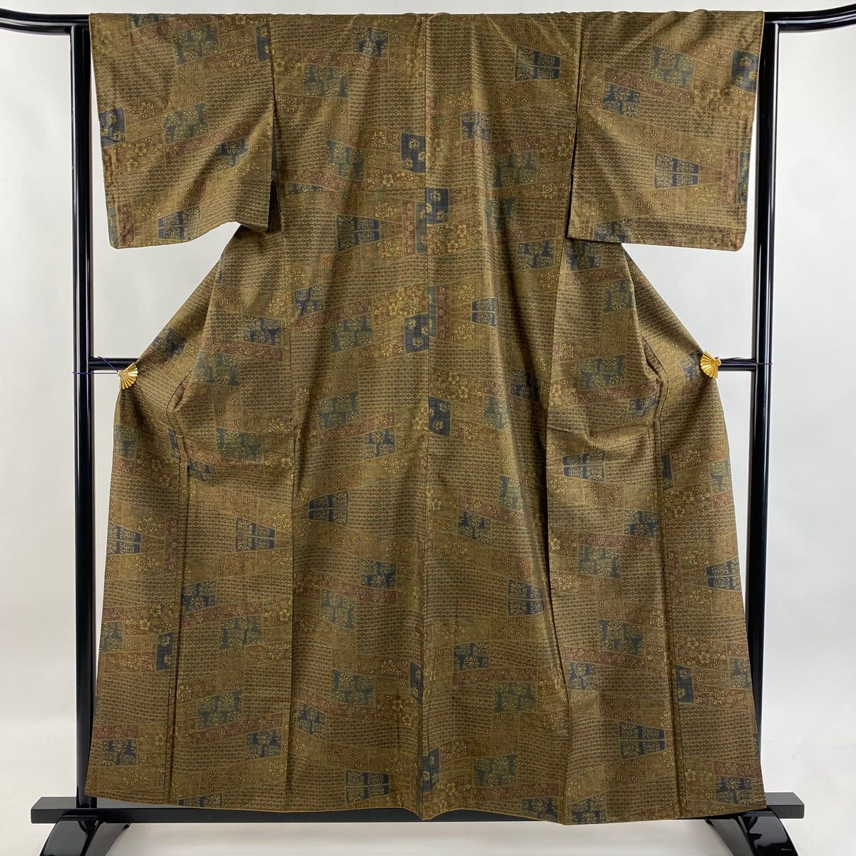 大島紬 身丈160cm 裄丈64cm M 袷 純泥染 証紙 草花 七宝 茶色 正絹