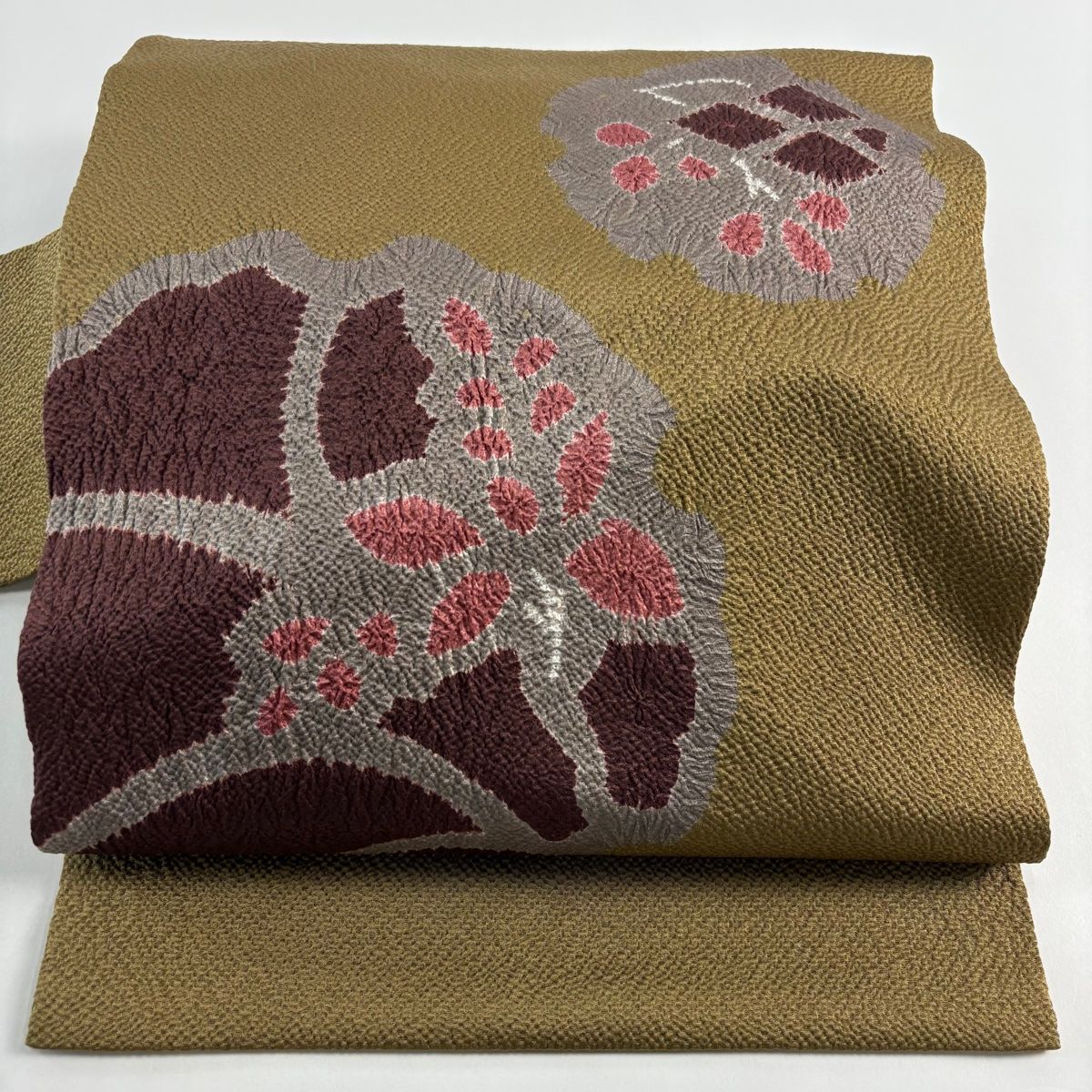 名古屋帯 秀品 雪輪 葉柄 絞り 薄茶色 正絹