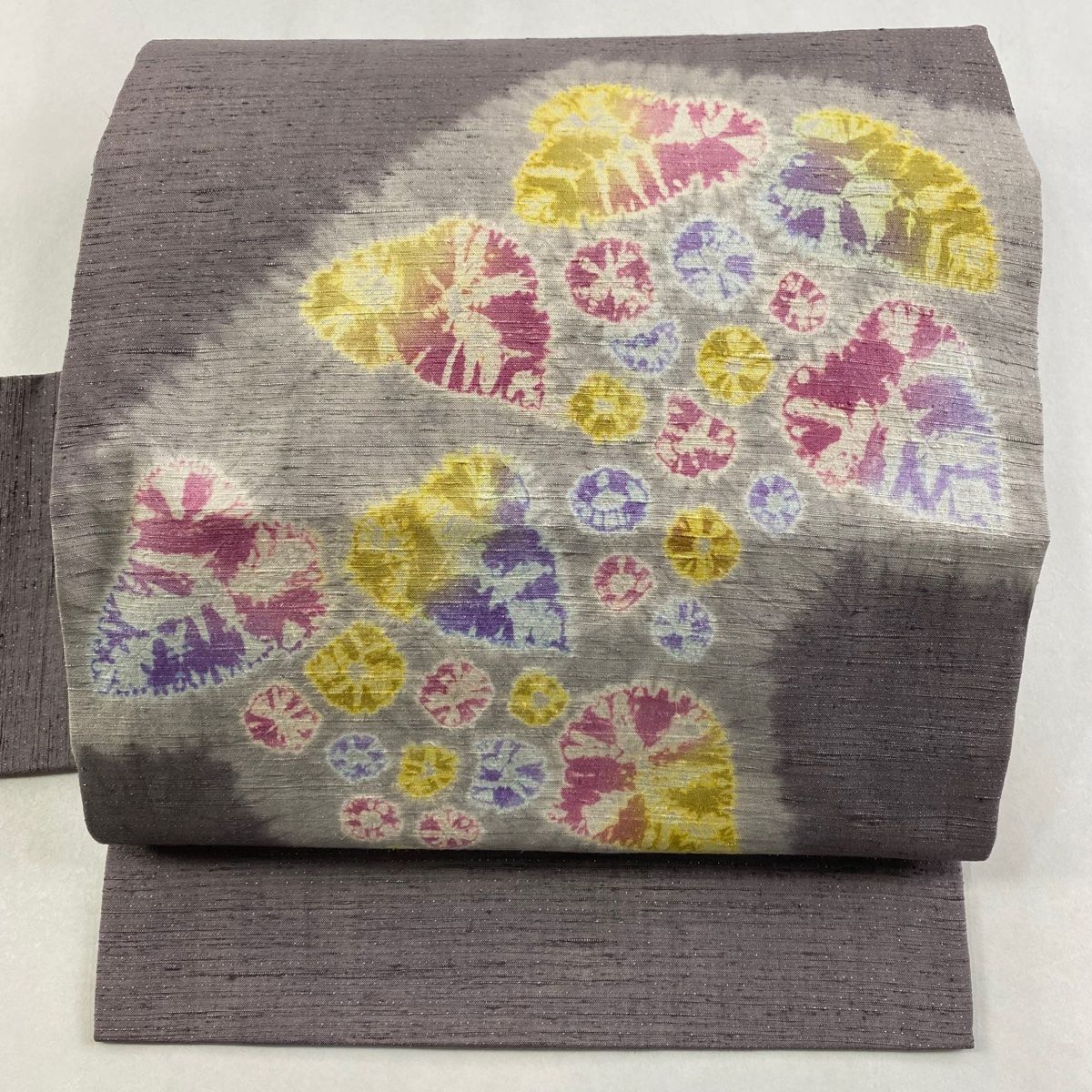 名古屋帯 秀品 紬地 葉柄 幾何学模様 絞り 銀糸 灰茶 正絹