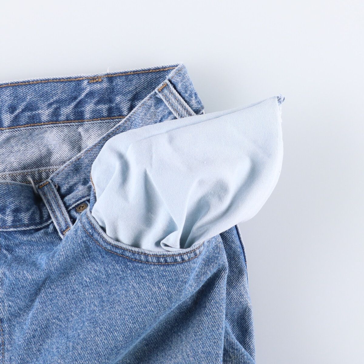 Carhartt テーパードデニムパンツ