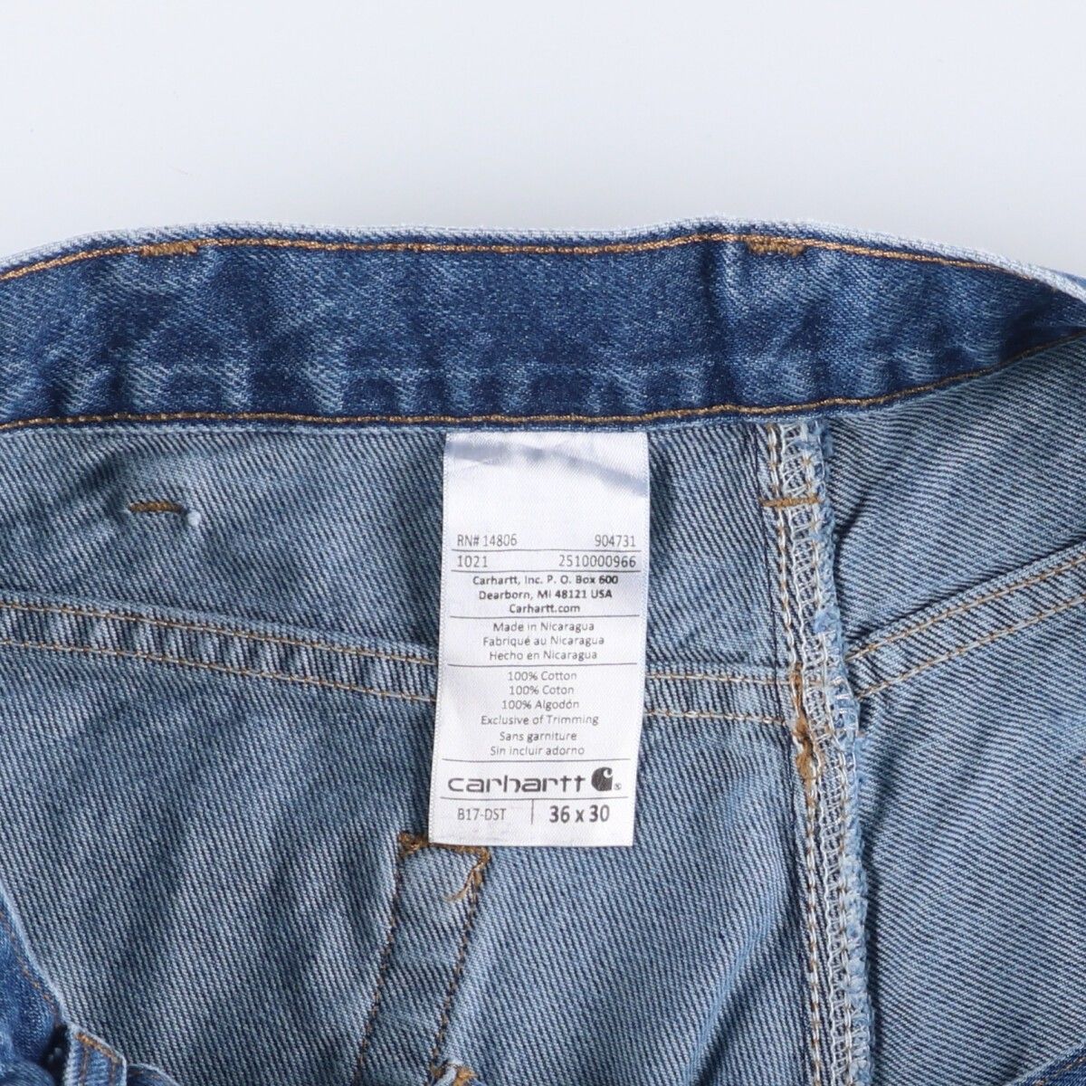 Carhartt テーパードデニムパンツ