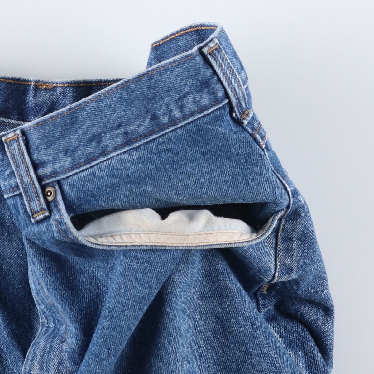 テーパードデニムパンツ