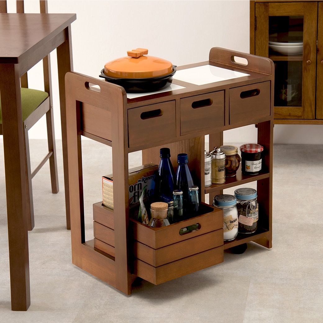 机下に収まる桐のキッチンワゴン