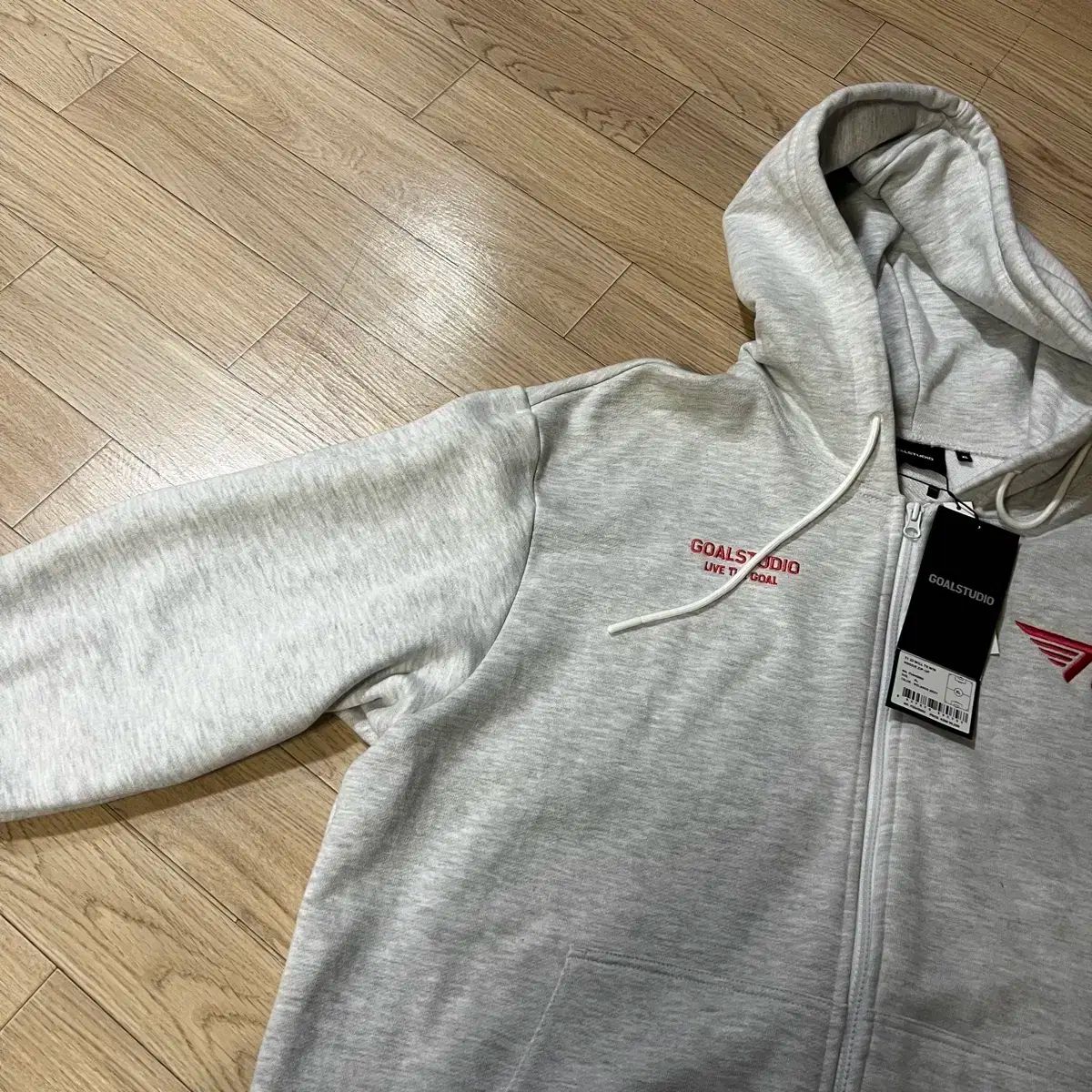 T 1 will to win フードジップアップ