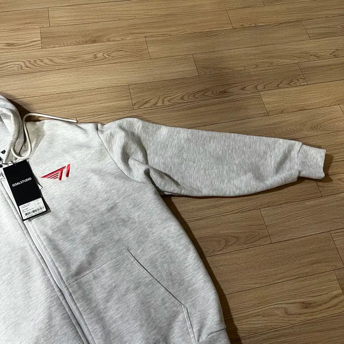 T 1 will to win フードジップアップ