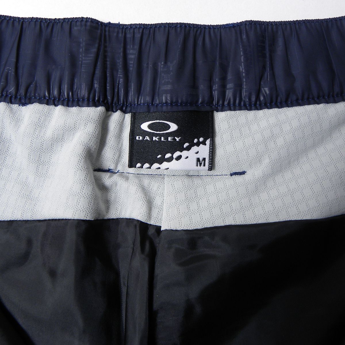 中綿キルトパンツ OAKLEY オークリー ポリエステルサテン 総柄 リブ