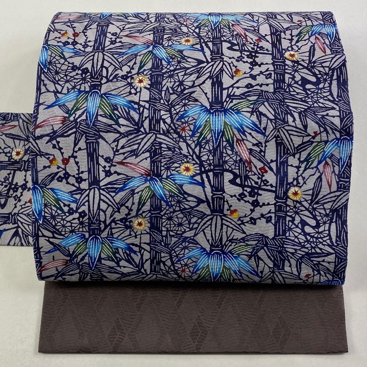 名古屋帯 城間栄順 落款 笹 竹 紅型 灰色 正絹