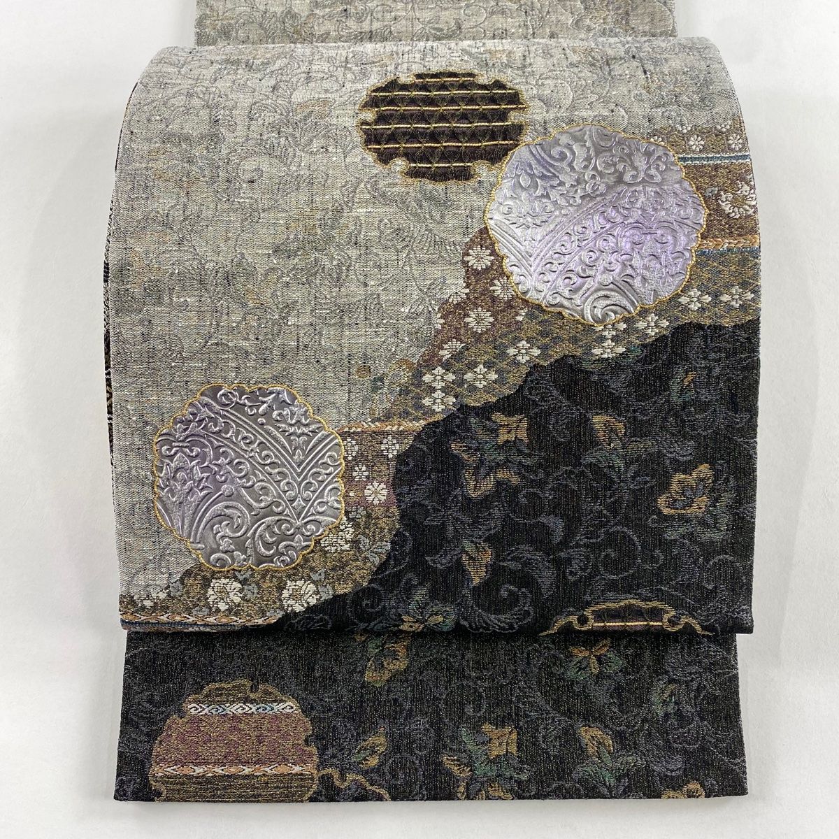袋帯 名品 雪輪 花唐草 金銀糸 銀彩 墨色 お太鼓柄 正絹