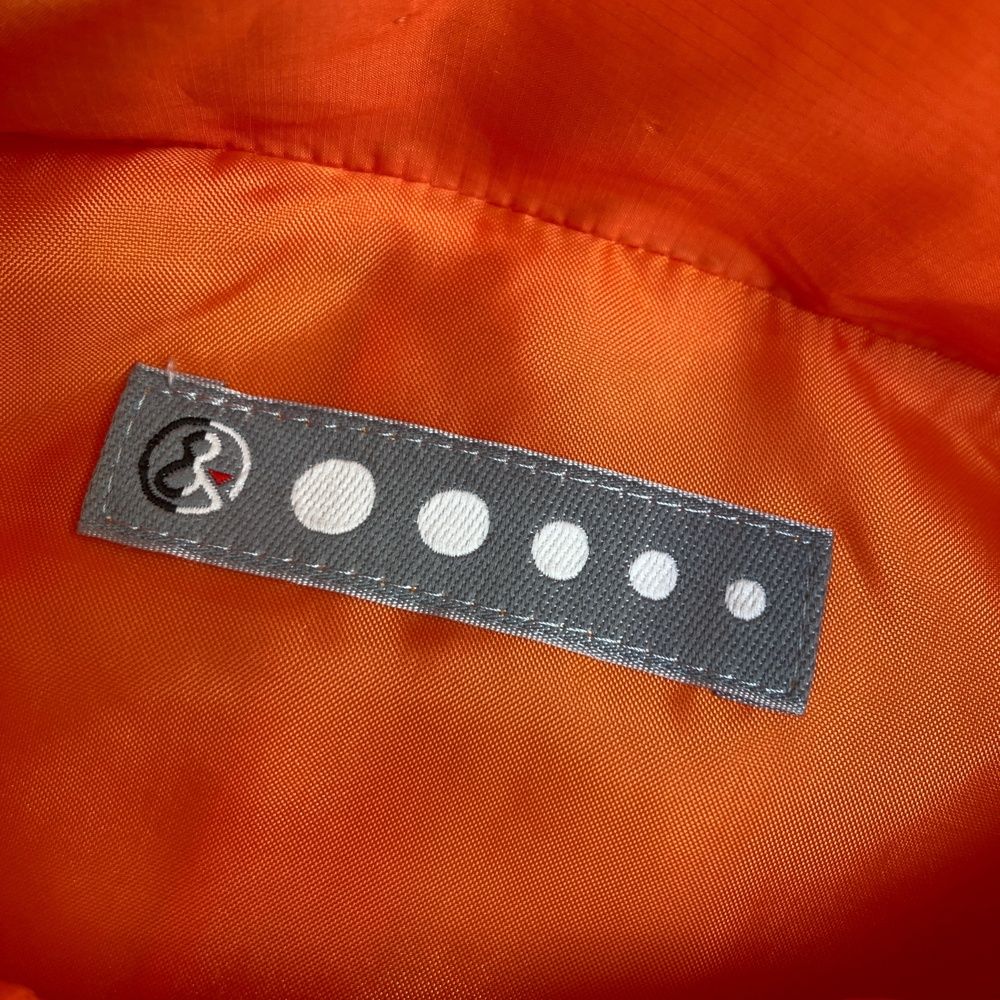  サイズ AND PER SE アンパスィ 中綿ワンピース フルジップ 総柄 オレンジ系 ゴルフウェア レディース ストスト ワンピース レディースウェア