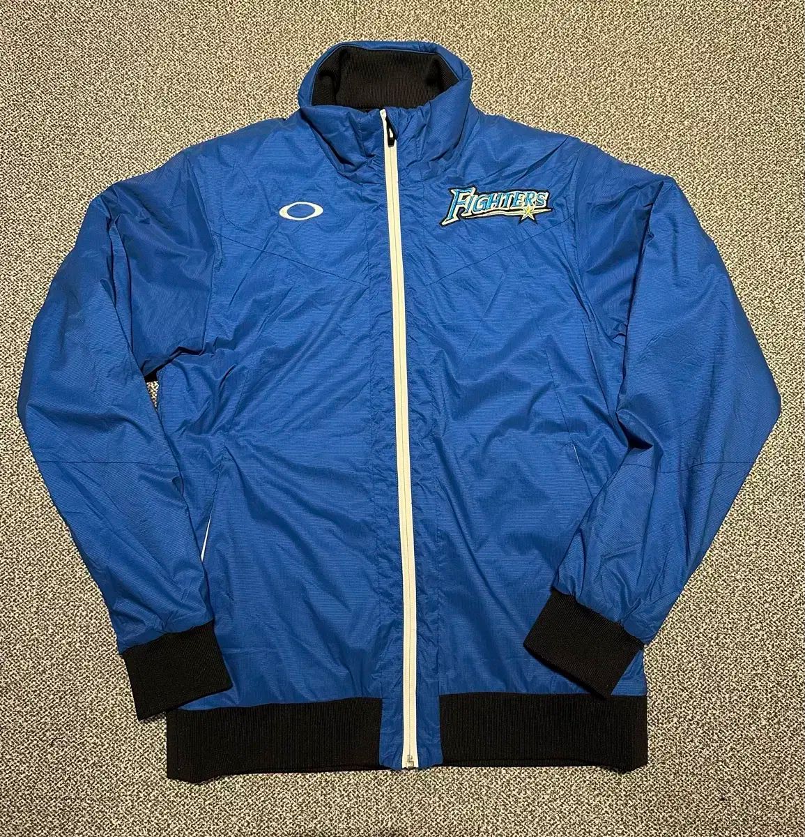 オークリー 日本 選手 Fighters ぬいぐるみ ナイロン ジャケット L