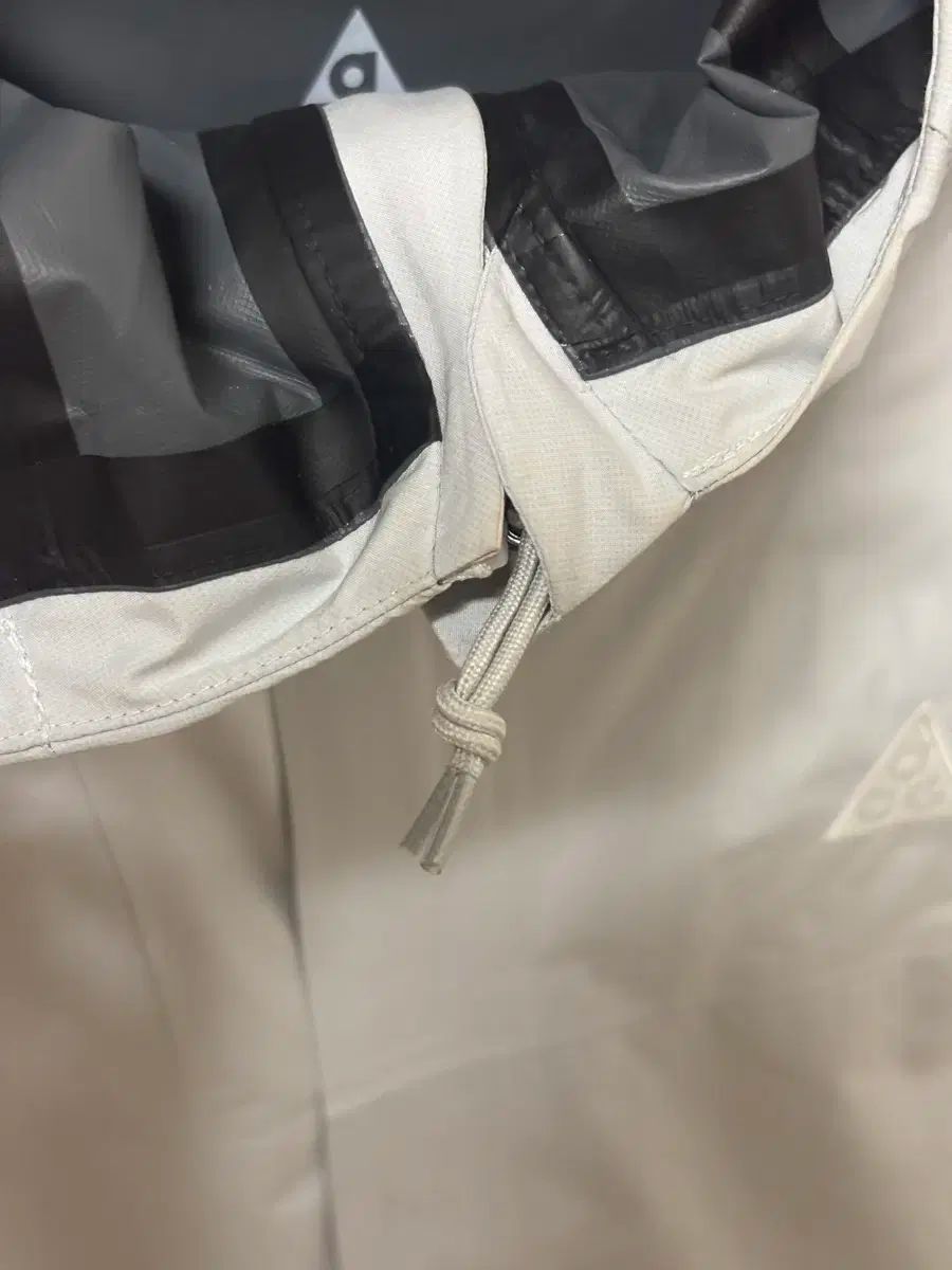 ナイキ ACG ADV ウィンドブレーカー ライトグレー S