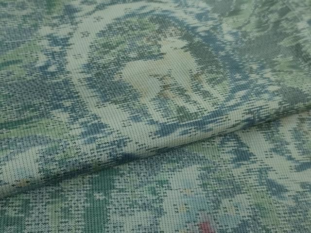 動物蝶丸文 藤絹織物謹製