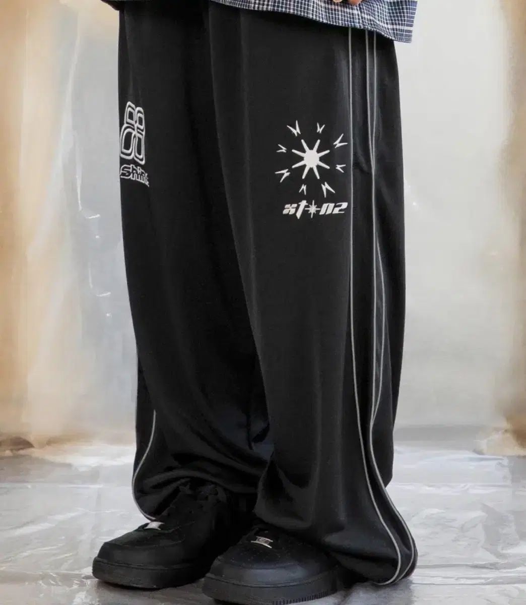 エクスストーンズ ブラックパンツ