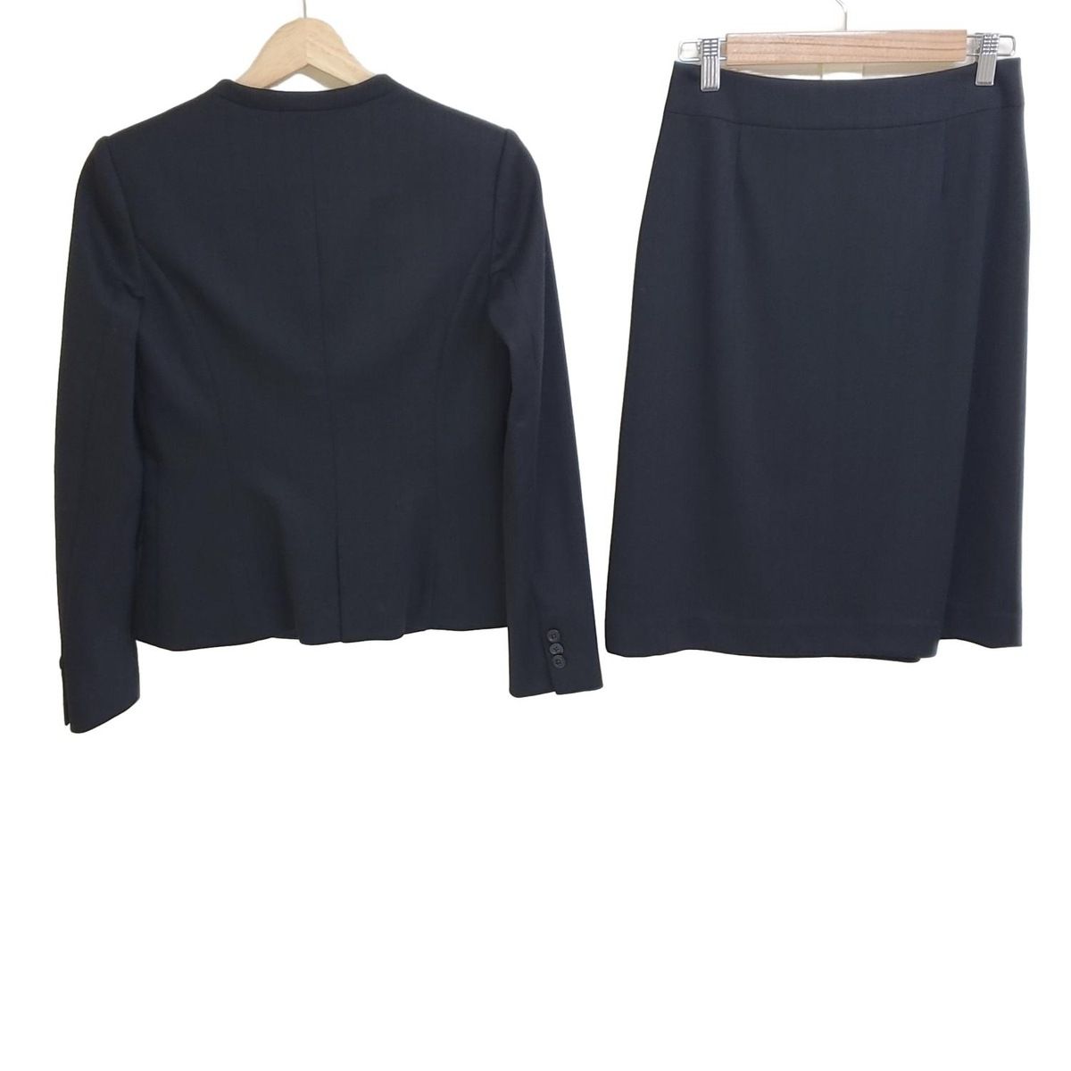 PaulStuart ポールスチュアート スカートスーツ レディース - 黒×ネイビー ストライプ 肩パッド