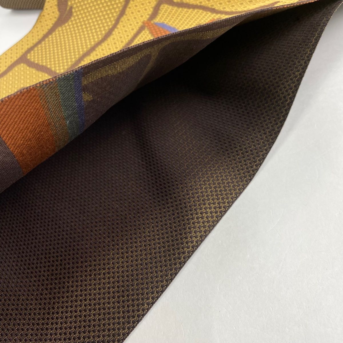  名古屋帯 秀品 八寸名古屋帯 トンネル仕立て 草花 幾何学 山吹茶色 正絹 名古屋帯 帯