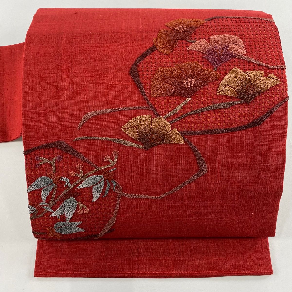 名古屋帯 秀品 紬地 関西仕立て 枝花 刺繍 赤 正絹