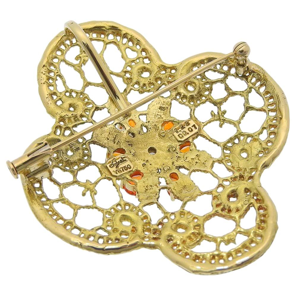鑑付 ジュネ JEUNET ブローチ 18.0 g K 18 YG イエローゴールド メレガーネット 1.23 ct メレダイヤモンド 0.07 花