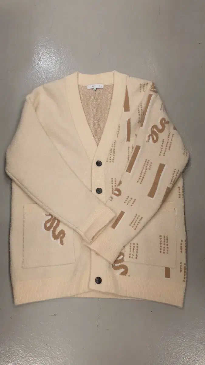 リーバークラッシー アイボリー スネーク パータン カーディガン