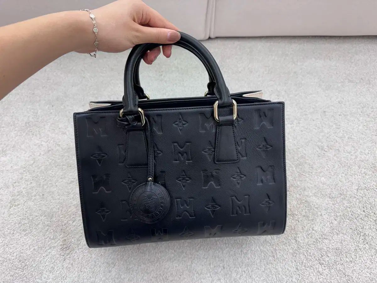 メトロシティ ブラック アイボリー クロス ドットバッグ