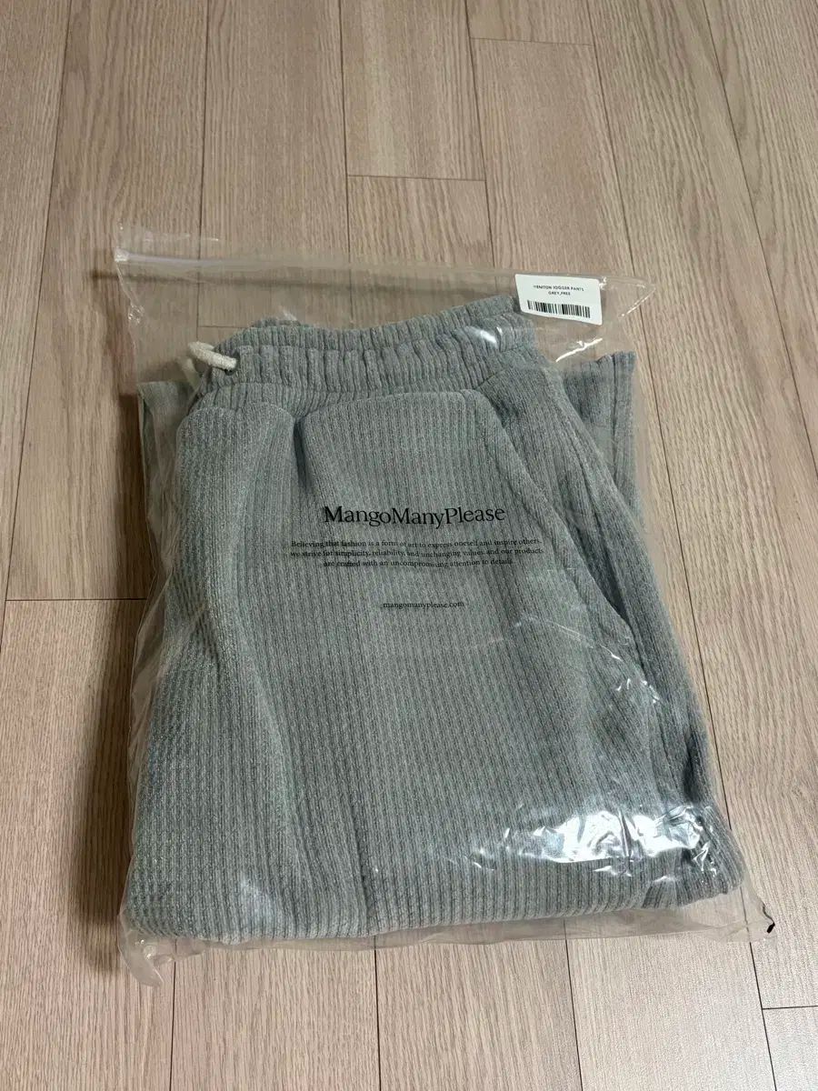 マンゴマンゴプリーズ ヘムトンジョガー グレー