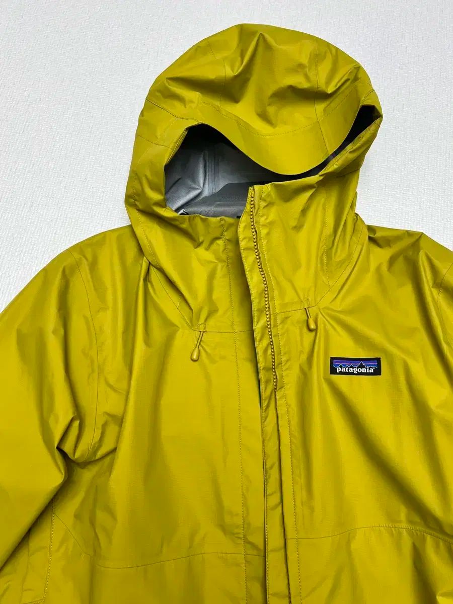 パタゴニア トゥーレン ウィンドブレーカー テキスト グリーン m