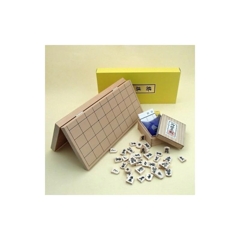 携帯に便利な将棋セット 囲碁ラボオリジナル鈴つき根付 つき 新桂７号折将棋盤と山形天童の正式書体白椿上彫駒